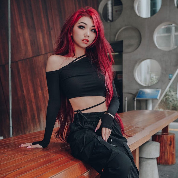 genmaicha strap top with streetwear black joggers on red hair model