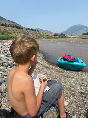 Child on a Scenic River Beach in Montana