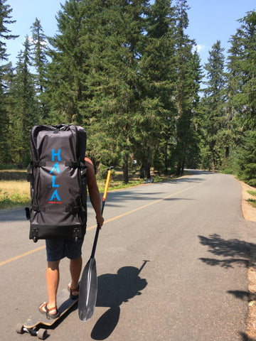 Long boarding with paddle board backpack