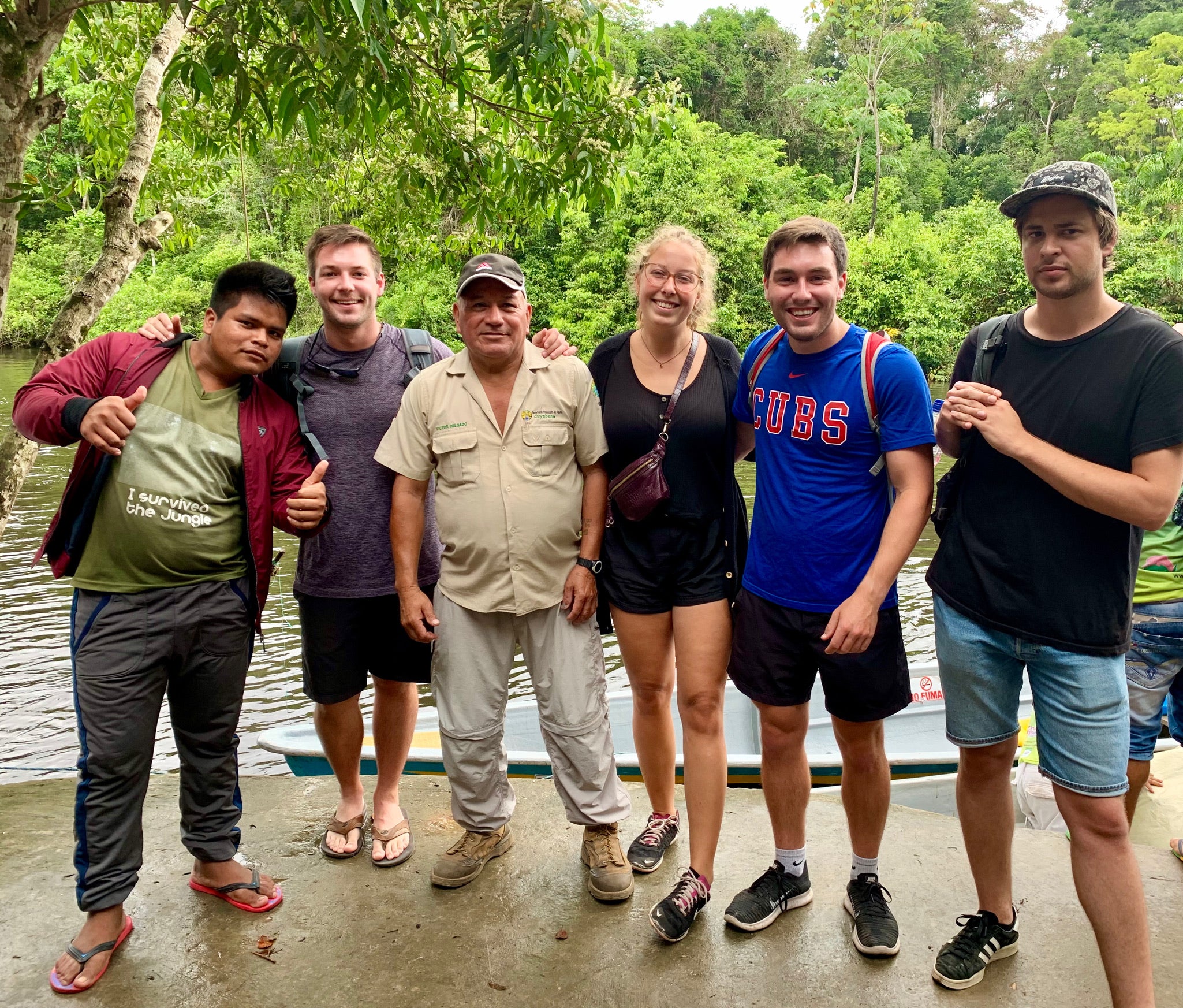 co-founder Drew in the Amazon rainforest with some of the guides and friends he made along the way