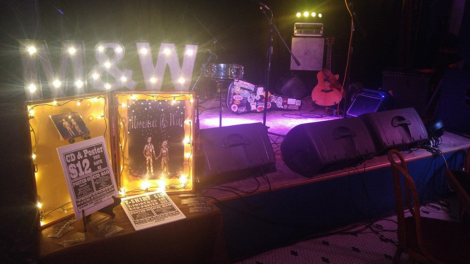 Merch displayed on stage