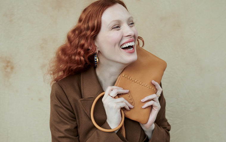 Karen Elson and the Sable wristlet