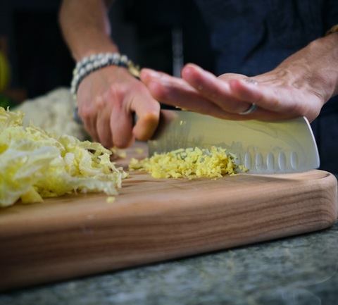 Cutting napa cabbage using a global santuko knife