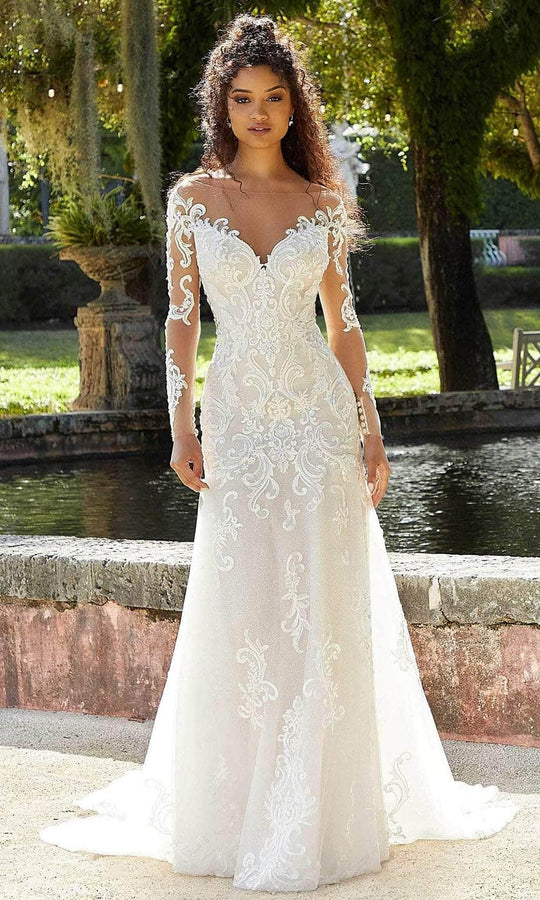 Wedding dress with long sleeves in mermaid cut with rhinestone embroidery