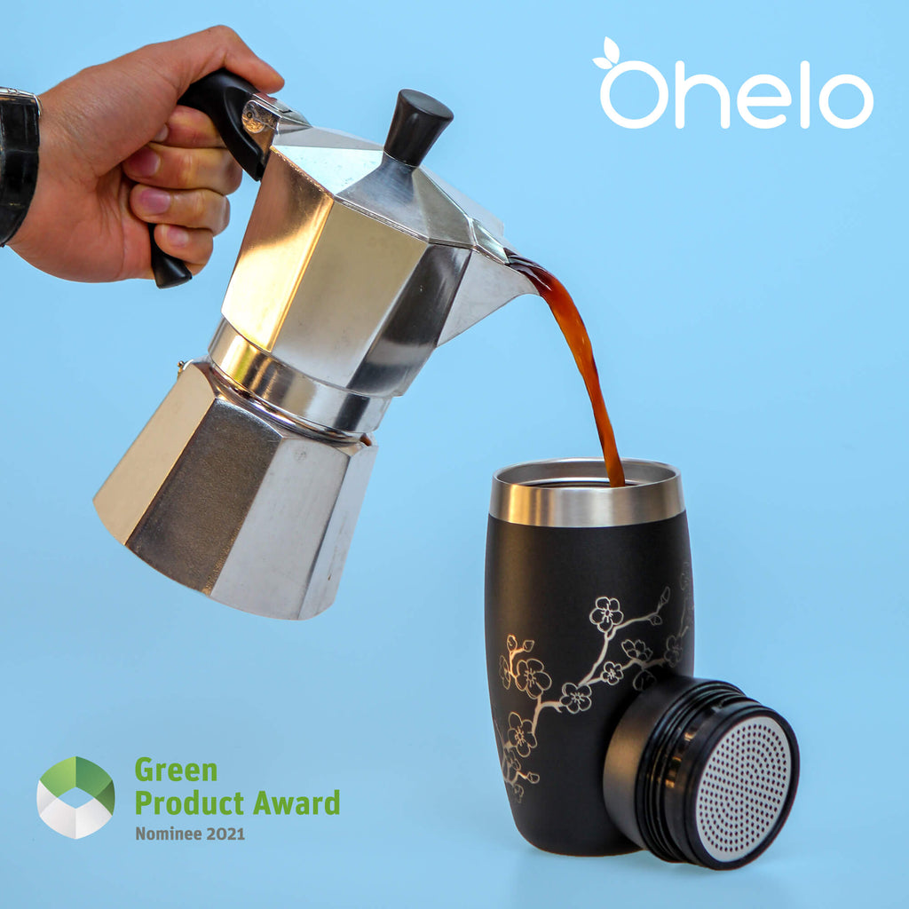 Ohelo Black blossom travel cup with coffee being poured in