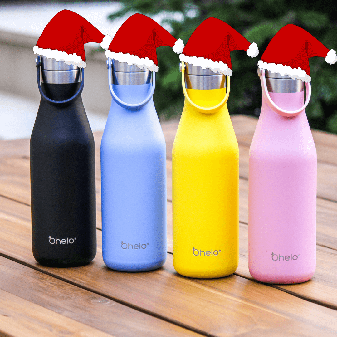 Lead free insulated water bottles in range of colours, wearing santa hats