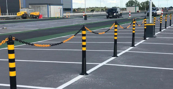 flexible delineator posts in a parking lot