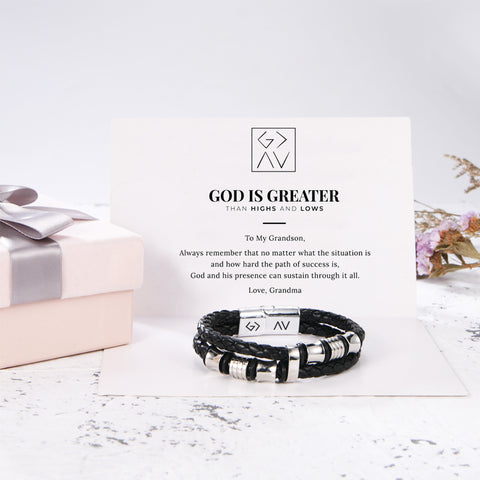 To My Grandson, God Is Greater Than Highs And Lows - Bracelet on top of a SVANA design message card