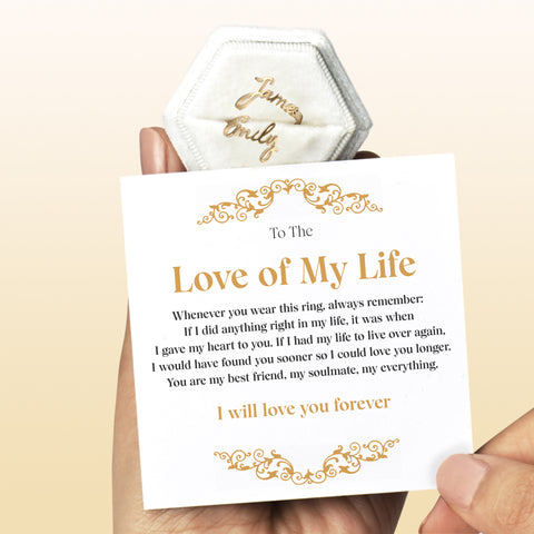 Personalized Couple Name Ring in a case behind an inspirational note