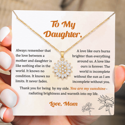 To My Daughter Sunflower Fidget Necklace hanging on a heartwarming note