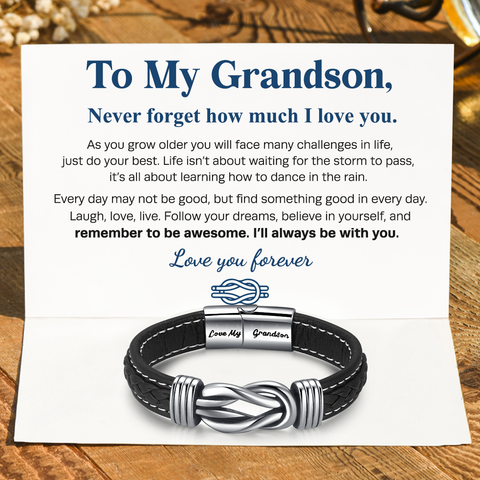 To My Grandson, Love You Forever Linked Braided Leather Bracelet on top of a folded note