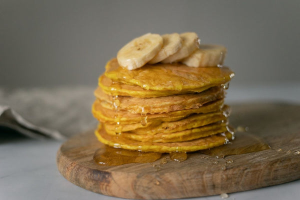 Pancakes topped with creamed honey