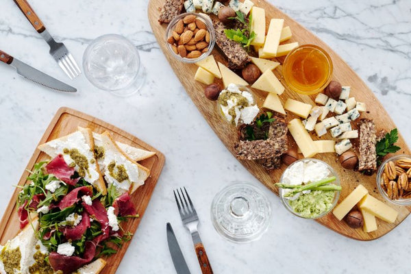 Lavish cheese board with creamed honey