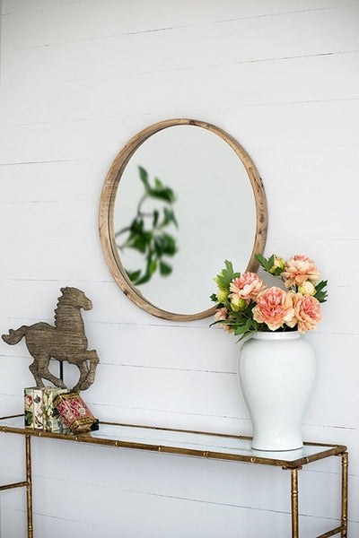 Image of round wall mirror decorated