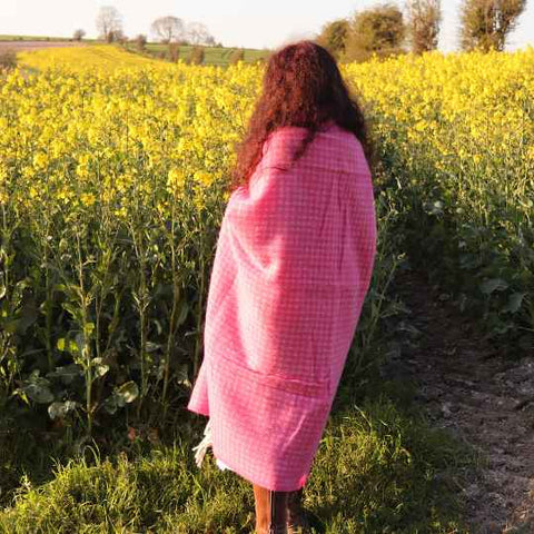 Hot pink blankets outdoors