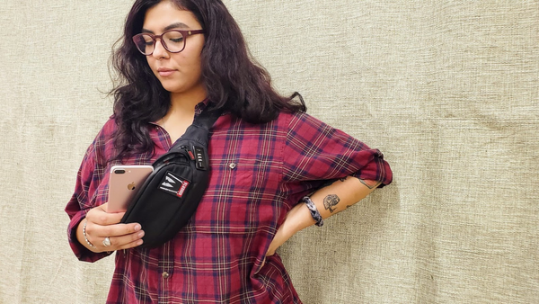 Woman in red flannel with Outfit smellproof fanny pack worn as a crossbody