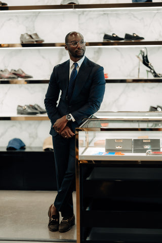 Fashion Designer Albert Lukonga Standing in his Fashion House