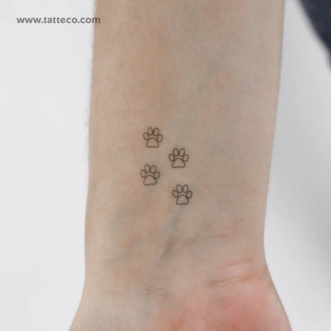 Dog paw print outline tattoo