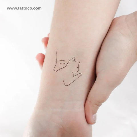 Female figure tattoo: Outline of a woman and a cat tattoo
