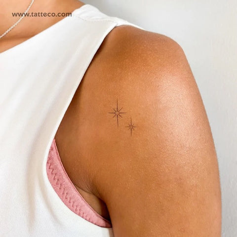 Friendship Tattoos: A fine line sparkling star tattoo on the shoulder