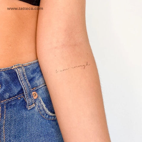 Mantra Tattoos: I am enough handwritten tattoo on arm