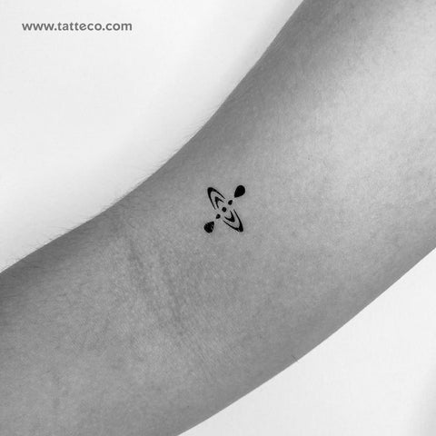 Mindfulness Tattoos: Black small mindfulness symbol tattoo