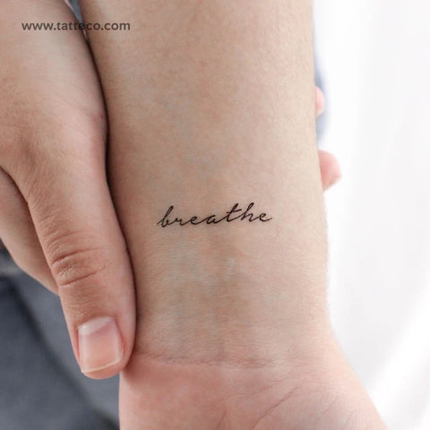 Mindfulness tattoos: breathe handwriting tattoo on the wrist