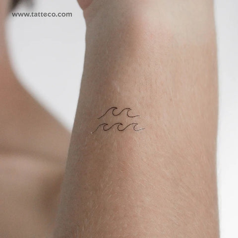 Mindfulness tattoos: Sea wave tattoo in a fine line minimal style