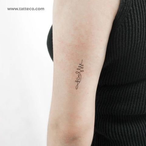 Mindfulness tattoo: Small Unalome symbol tattoo