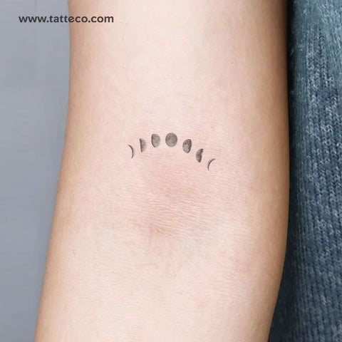 Moon phase tattoo: grey watercolor, small moon phases tattoo