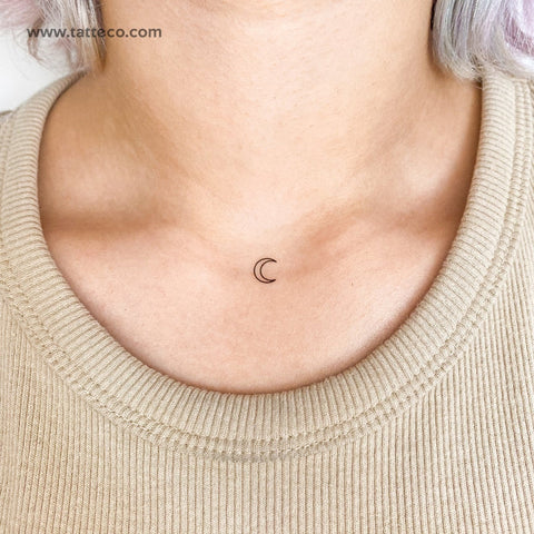 Moon phase tattoo: small crescent moon outline tattoo on the throat chakra