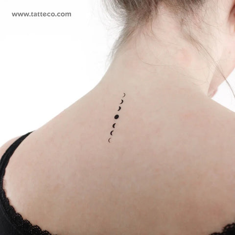 Vertical moon phases tattoo on the back of the neck