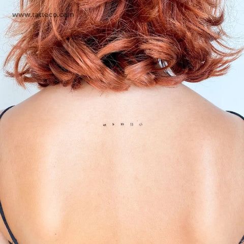 Music tattoos: Ipod music control symbols tattoo