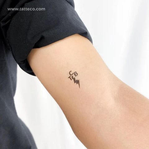 Music tattoos: Elvis Presley Tattoo Taking Care of Business Band Logo Tattoo