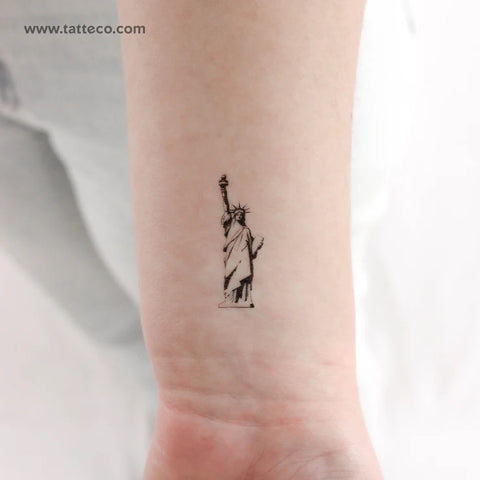 New York Tattoos: Statue of Liberty black and white tattoo on wrist