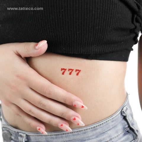 Red Tattoos: 777 red angel number tattoo