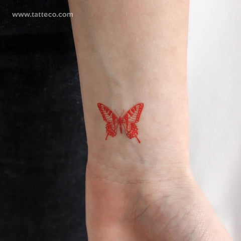 Red Tattoos: red butterfly tattoo