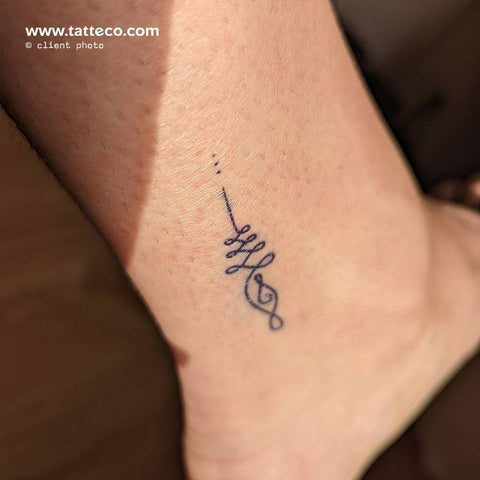 Unalome semi-permanent tattoo