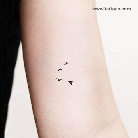 birds on telephone wire tattoo
