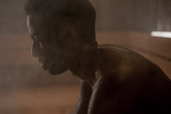 Man sweating in a sauna