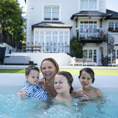 Family in a swim spa