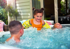 Kids in a swim spa