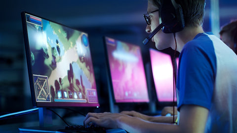 Photo of a professional eSport gamers playing in video game