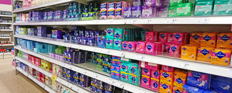 tampon tax, period pads on supermarket shelves