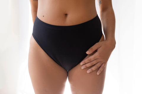 woman wearing black period underwear