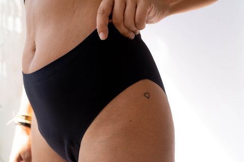 woman wearing black period underwear from ruby life