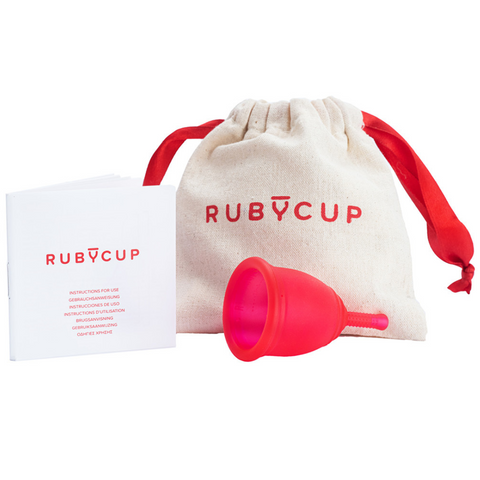 Ruby Cup image of a Ruby Cup, Ruby Cup pouch, and Ruby Cup instruction booklet.