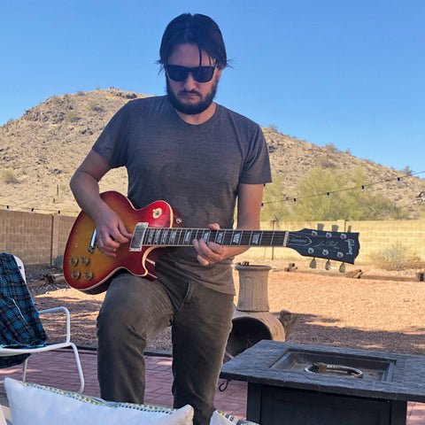 JT plays his Les Paul on the patio