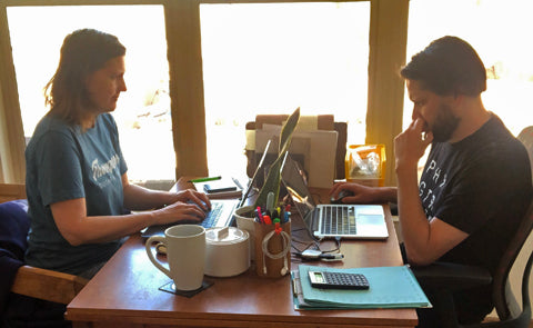 JT & Courtney at their shared desk