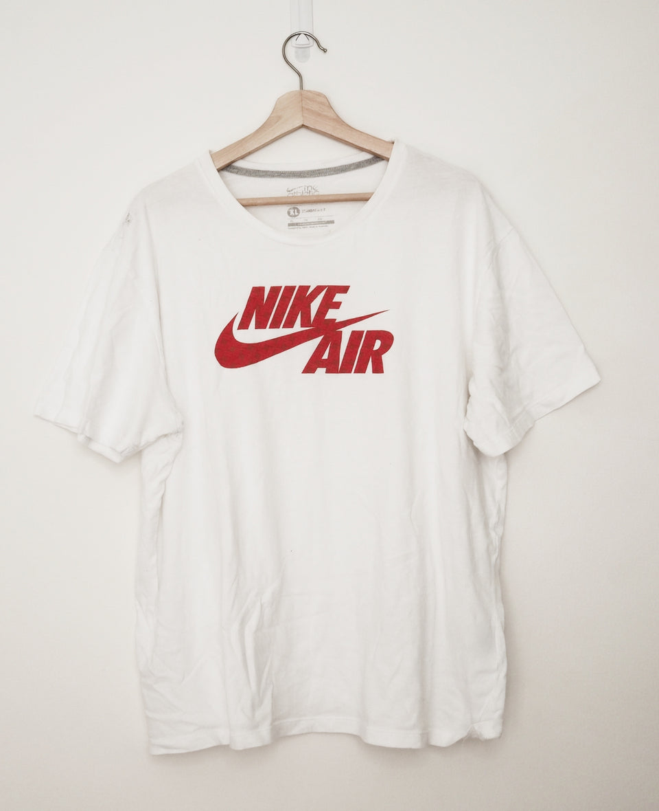 white nike shirt red logo